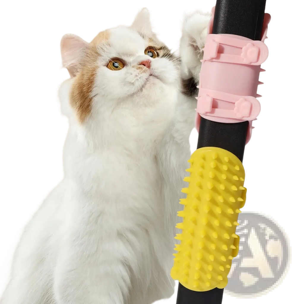 Pink and yellow silicone cat massage comb with black handle designed for self grooming and fur massage