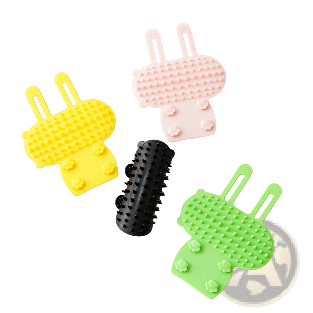Cat massage comb silicone self grooming brush with yellow pink green and black bunny shapes and textured surfaces for massaging