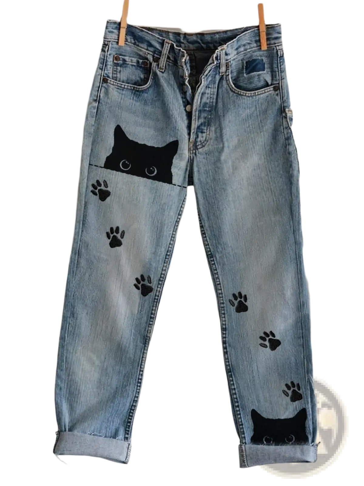 Cat print faux denim flared trousers in light wash featuring black cat face and paw designs on front pockets and legs