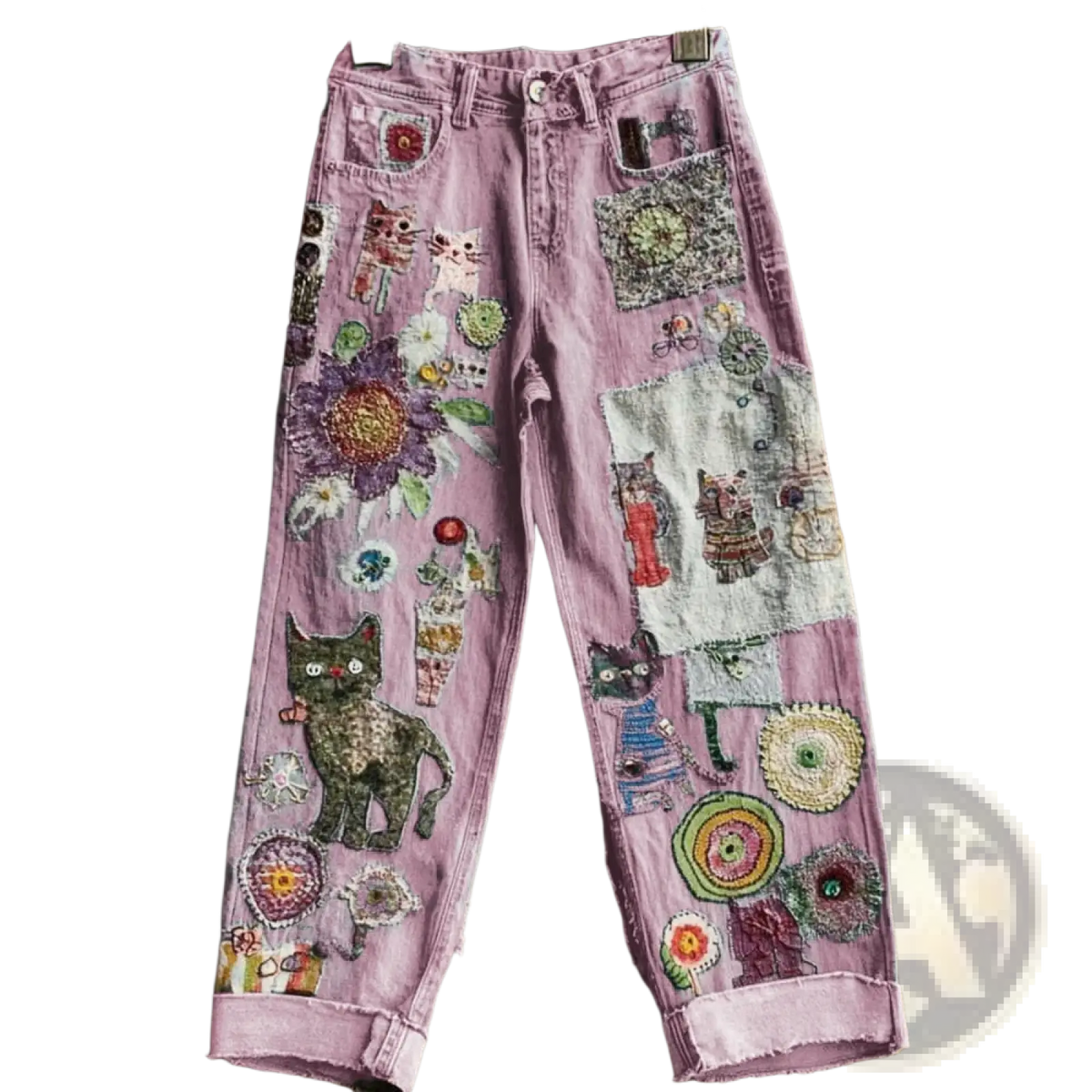 Lavender denim flared trousers with colorful embroidered cat, flower, and circular patches in faux denim material