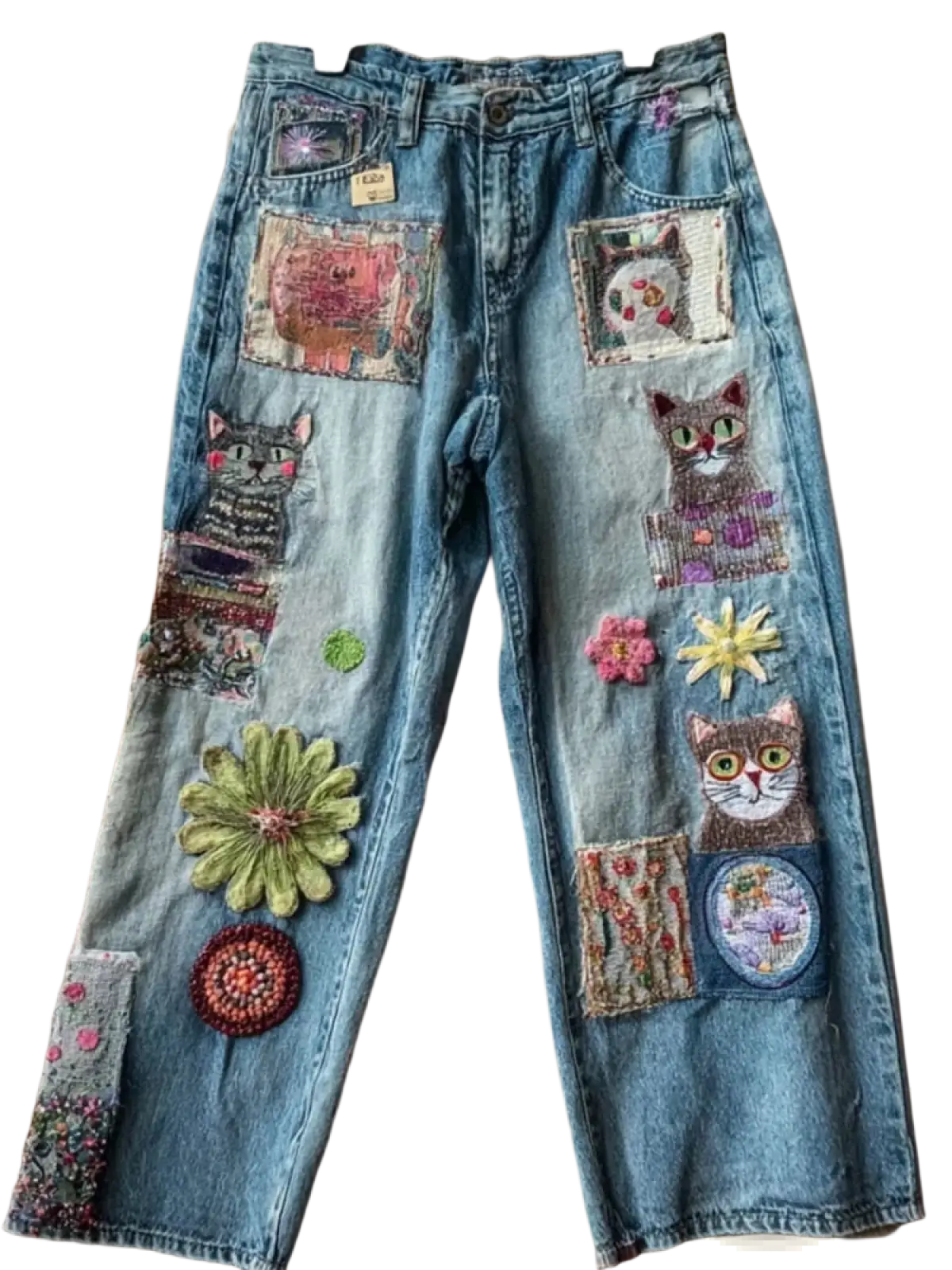 Blue denim faux flared trousers featuring colorful embroidered cat and floral patches on the front side