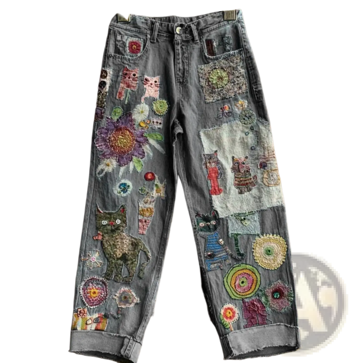 Grey faux denim flared trousers with colorful embroidered cat, flower, and circular patches for stylish wear