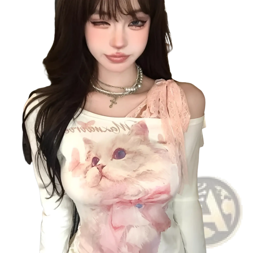 White long-sleeved cat print lace halter top with pink cat illustration purple eyes bow and sheer lace shoulder detail