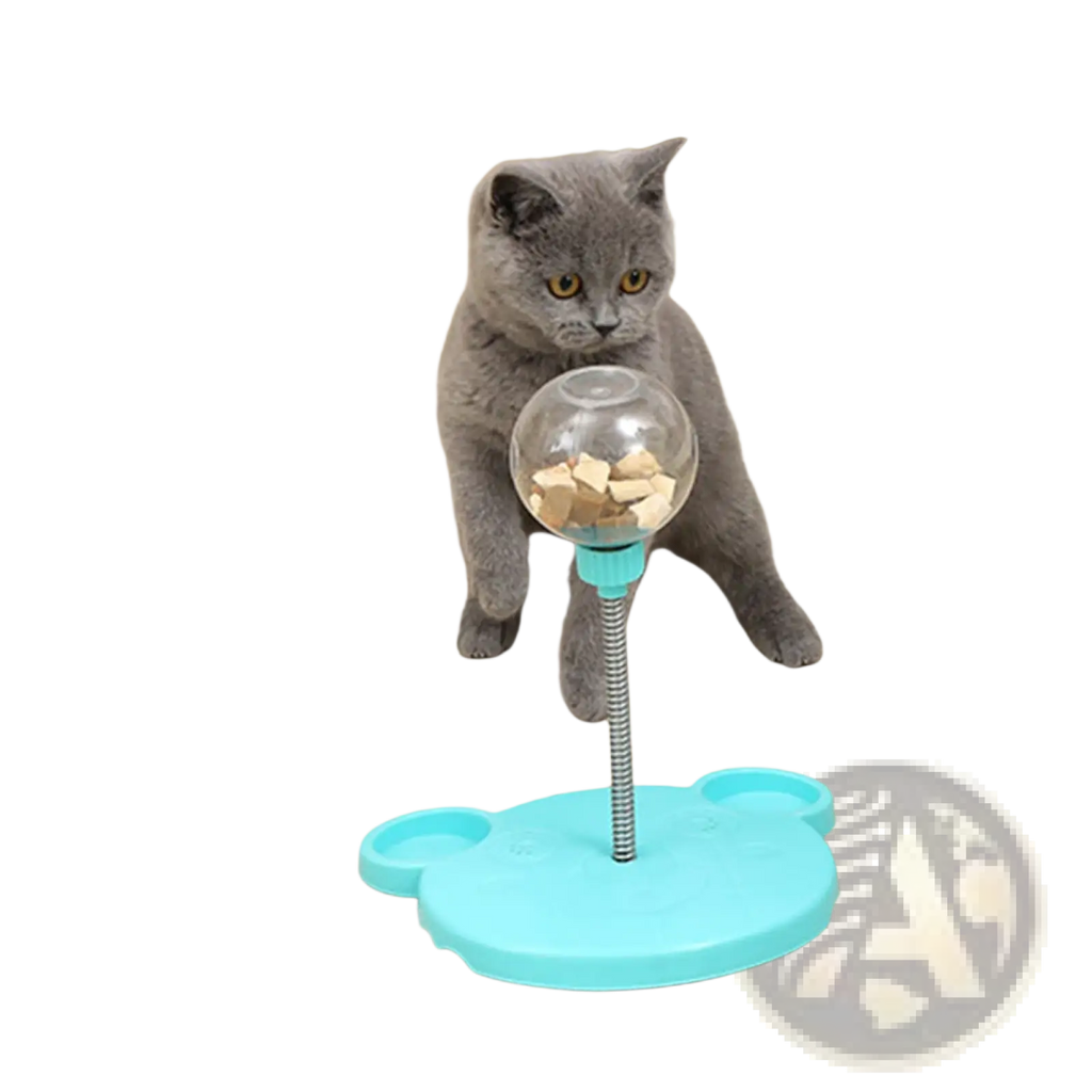 Turquoise bear-shaped cat puzzle toy tumbler food dispenser with clear glass treat sphere on flexible metal stem