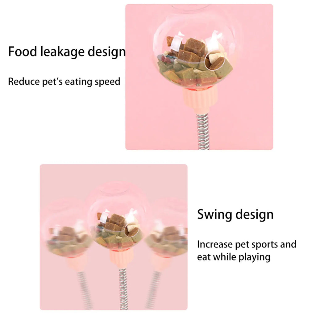 Transparent spherical cat puzzle toy tumbler food dispenser with pink base silver spiral stem and suction cup