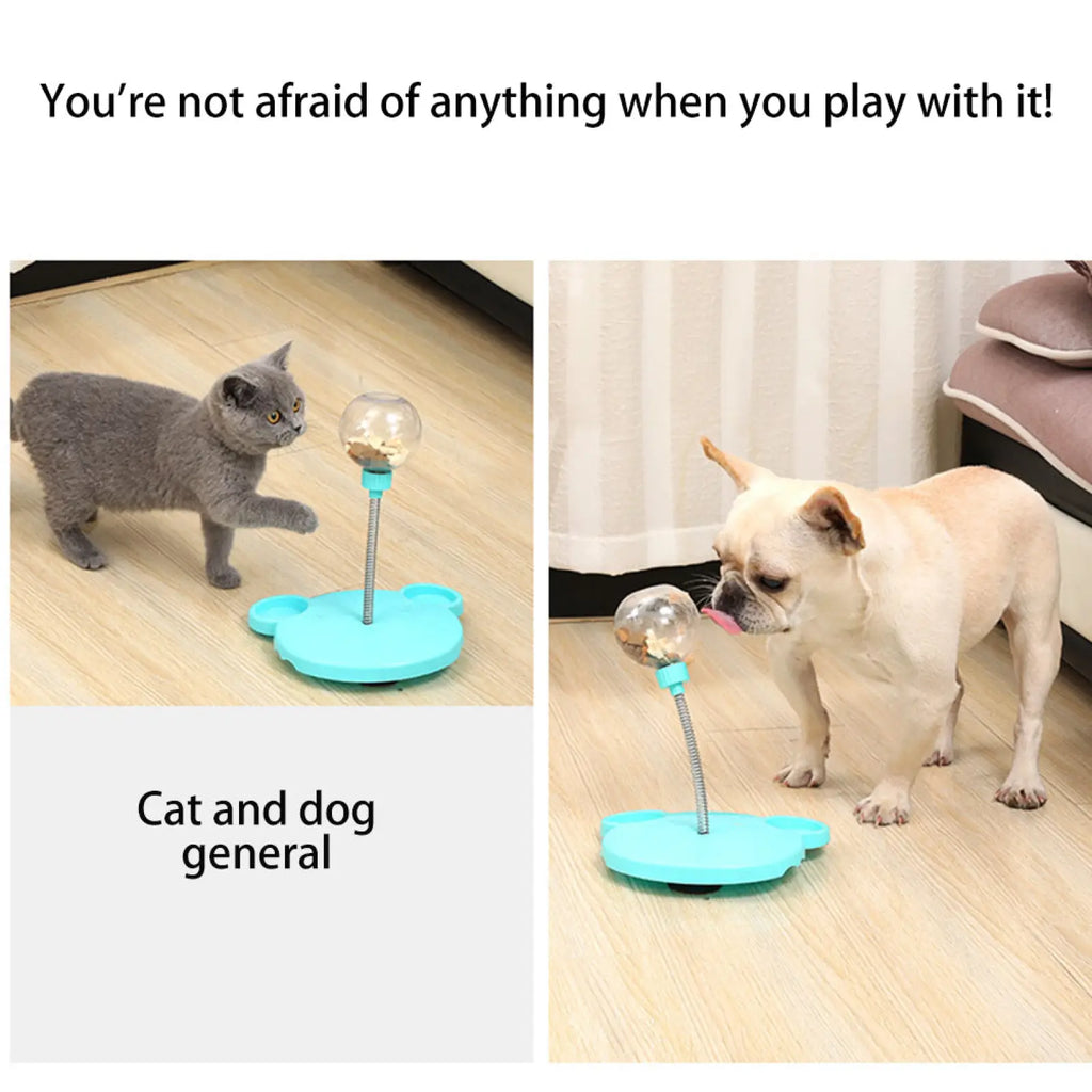 Light blue plastic cat puzzle toy tumbler with flexible metal stem and clear spherical treat dispenser and suction cup
