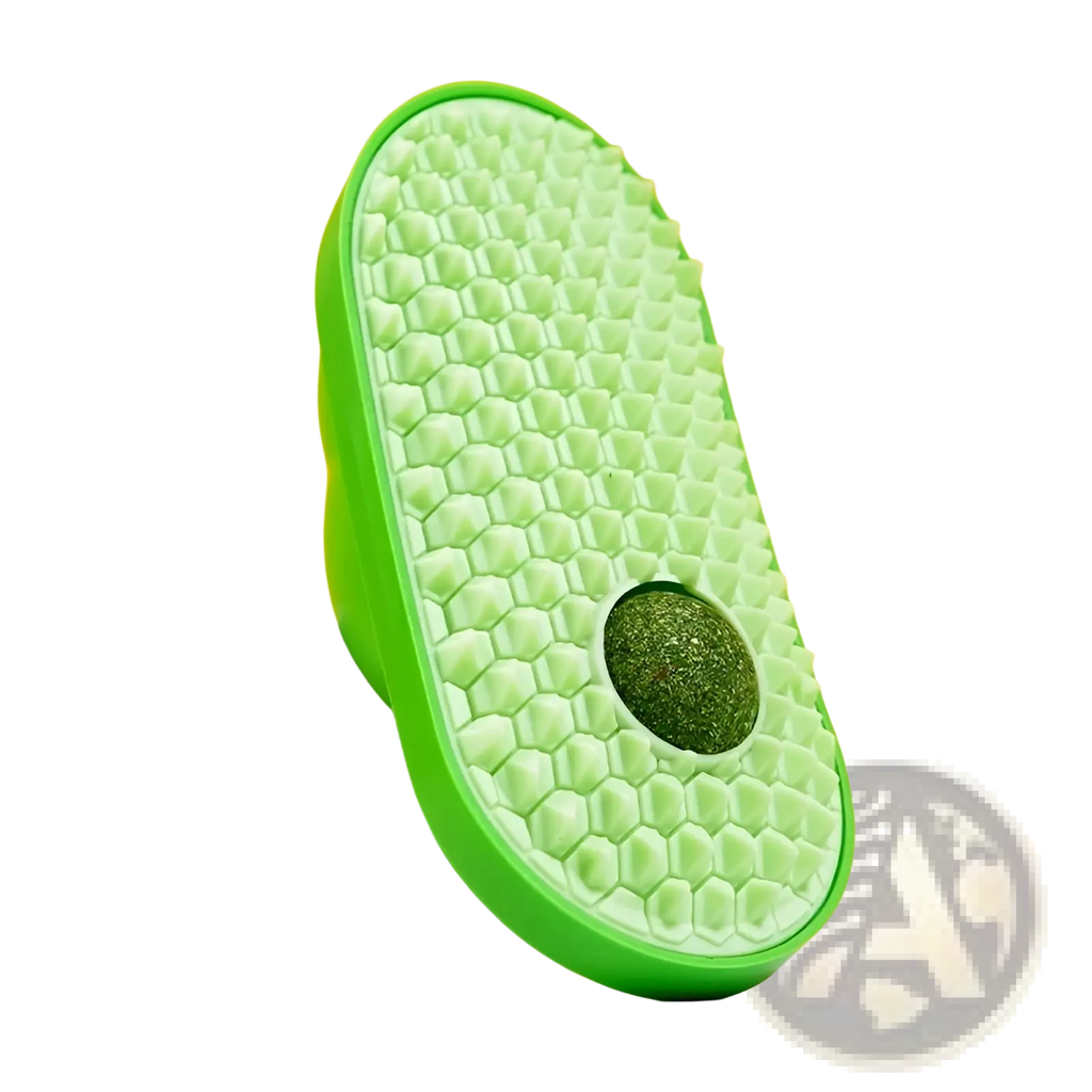 Bright green silicone cat self grooming brush with hexagonal textured surface and embedded circular massage ball
