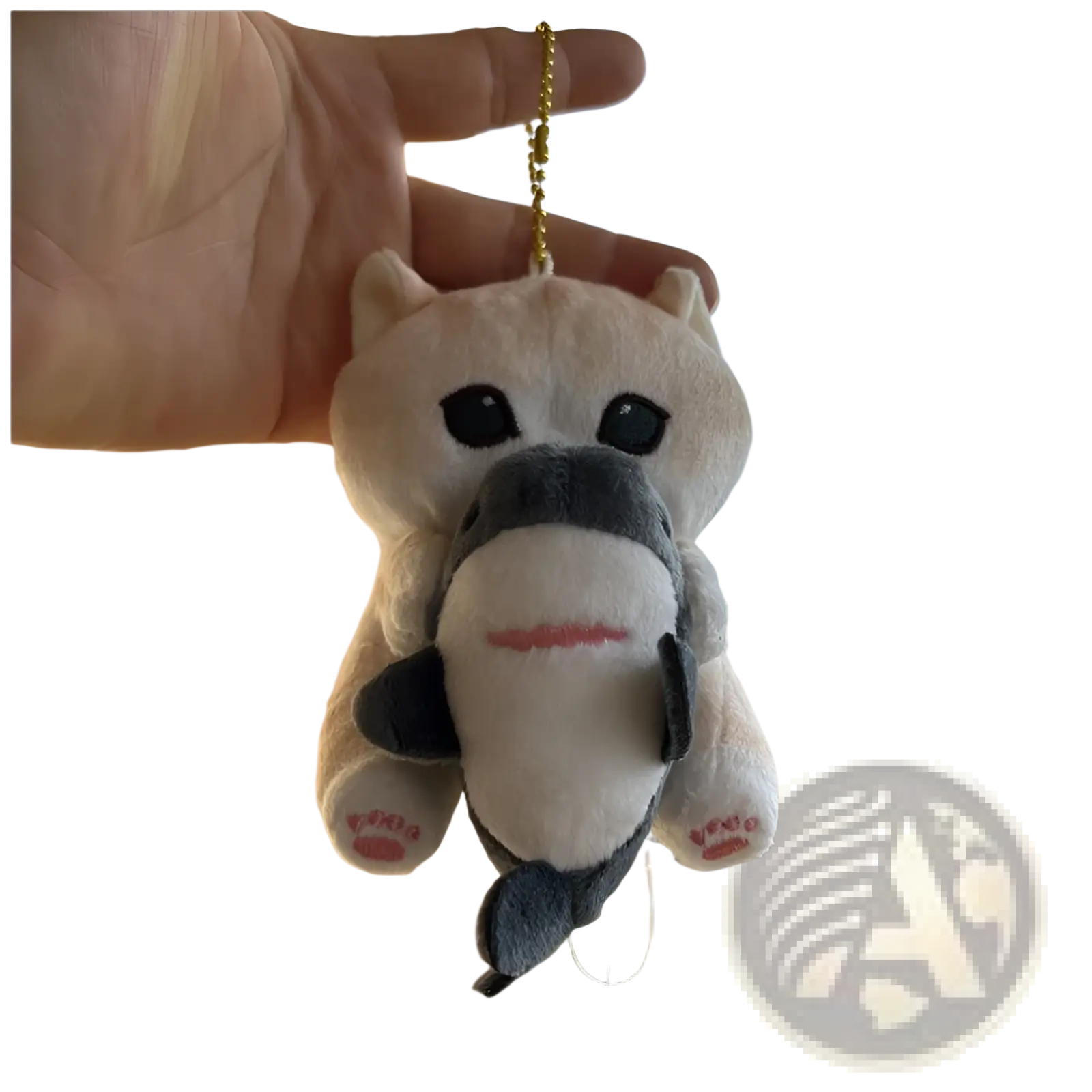 A plush white and gray cat shark keychain with black eyes and pink mouth detail featuring a soft texture