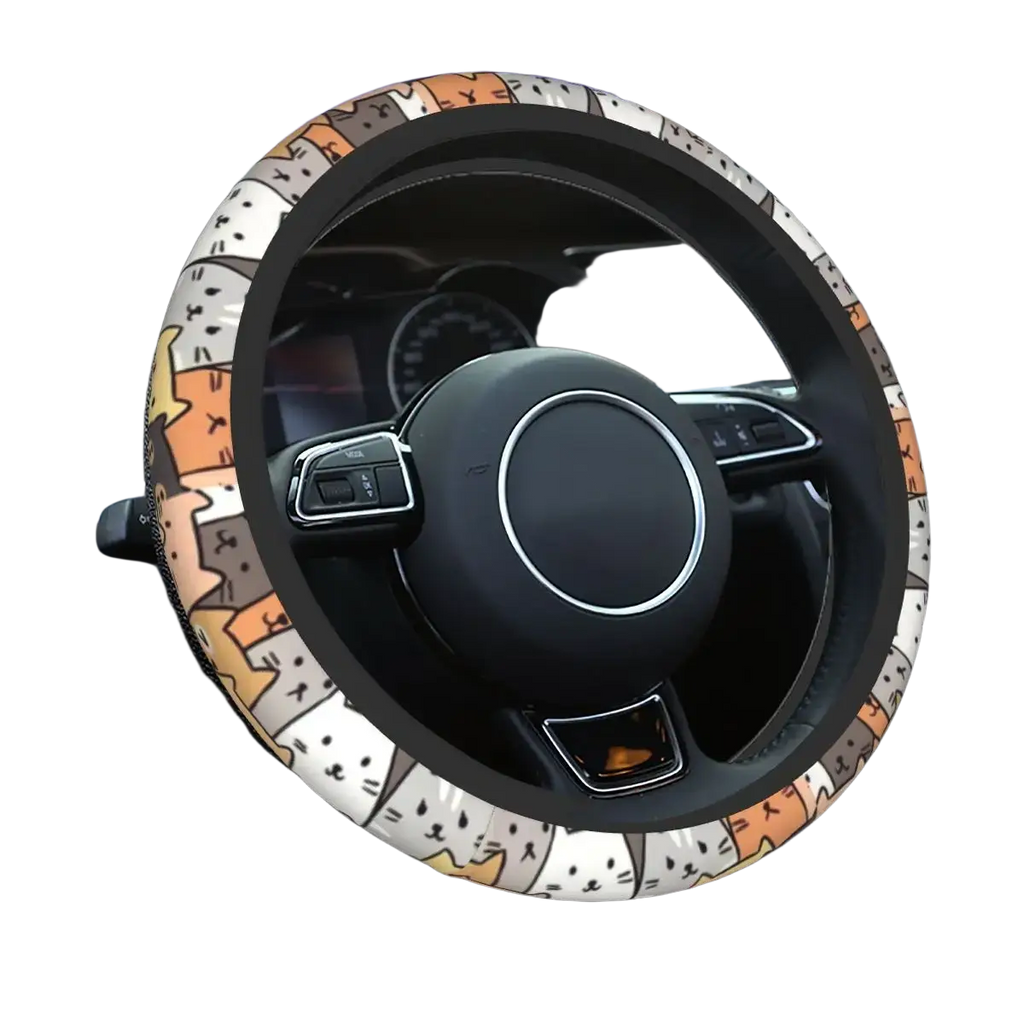 A colorful cartoon cat patterned faux leather steering wheel cover with black inner rim and outer fabric trim