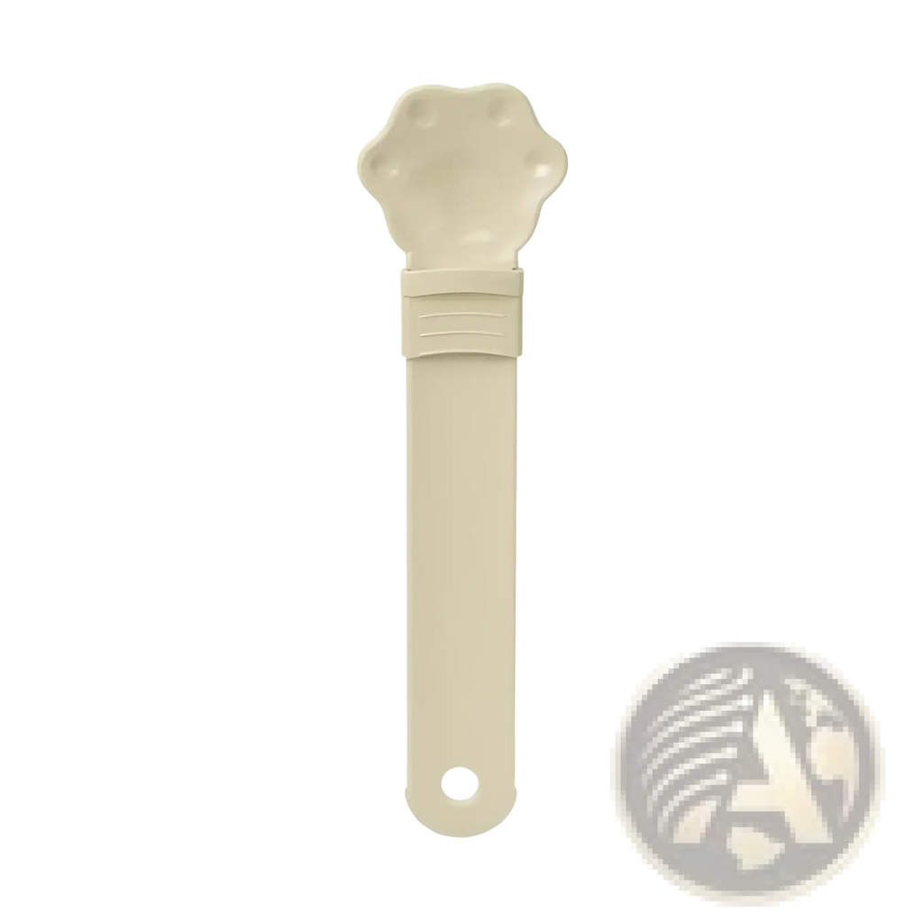 Beige plastic cat strip feeder pet bowl with paw-shaped handle and textured grip for grooming use