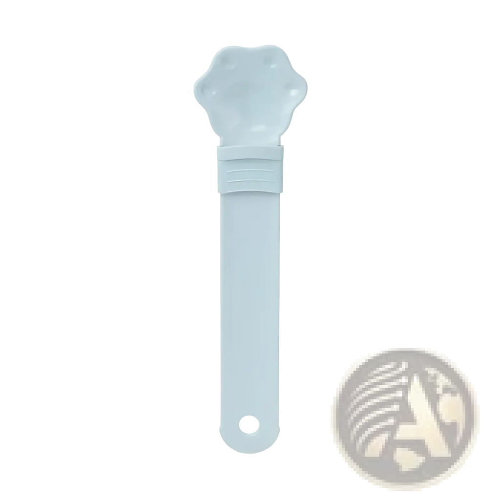 Light blue silicone ice cube tray shaped like a paw print with measurement markings for cat strip feeder pet bowl
