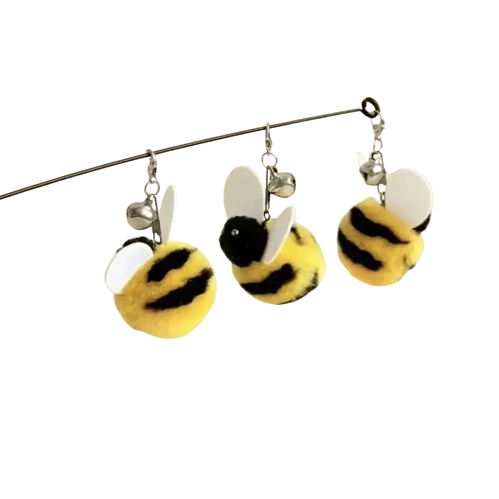 Yellow and black fuzzy bee-shaped cat teaser toy with white wings and silver bells designed for interactive play
