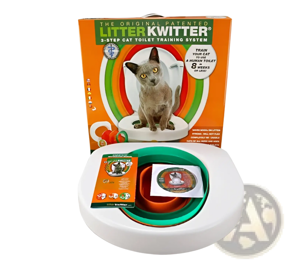 White plastic cat toilet training system with green silicone seat ring and orange instructional booklet visible