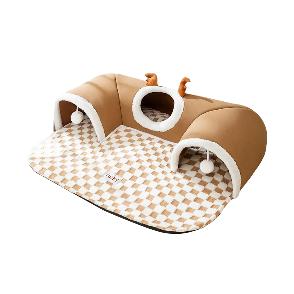 Brown plush cat tunnel bed with white fur trim checkered floor mat and small orange deer antler decorations