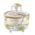 Clear plastic cat water fountain with white and yellow daisy flower top and submerged pump usb water dispenser