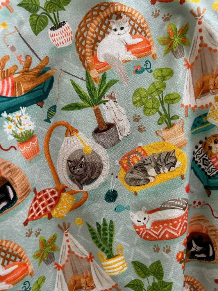 Light blue cats and plants vintage a-line skater skirt fabric with playful cat hammocks and potted plant pattern