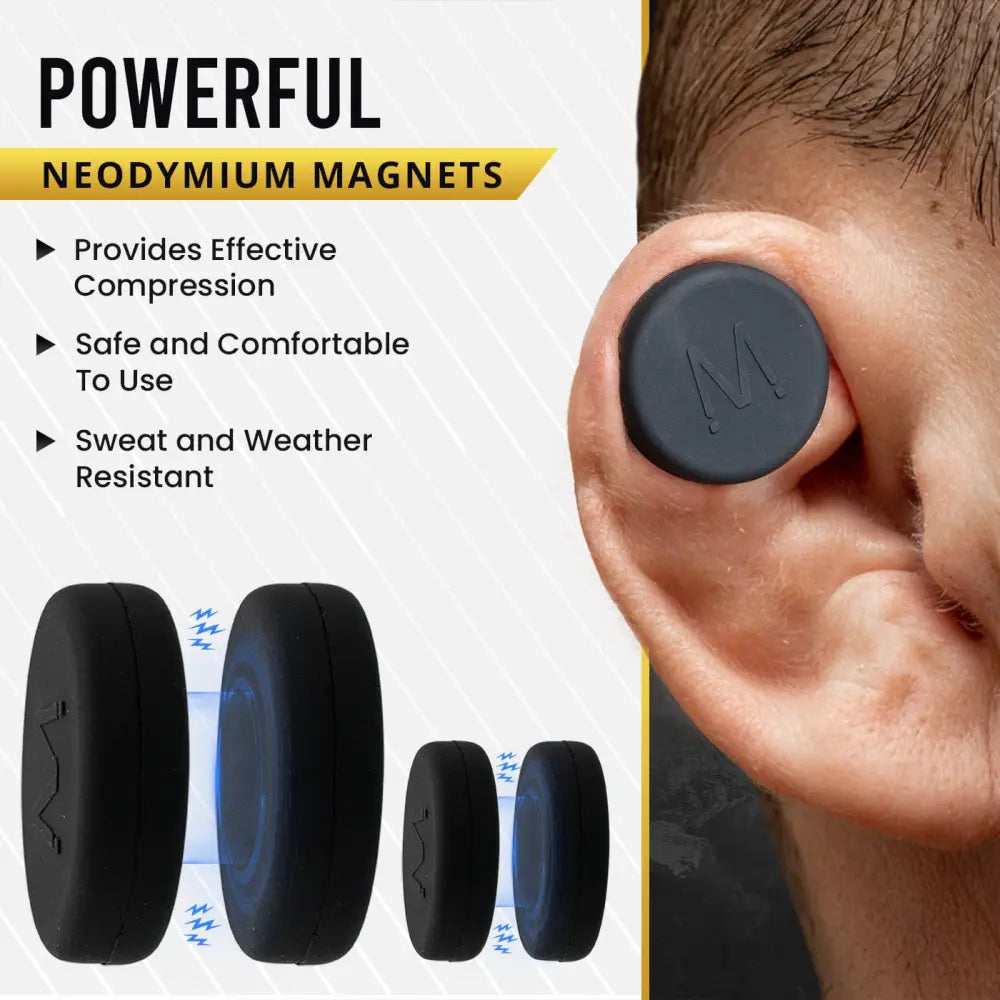 Black circular silicone ear compression pad with subtle m logo designed for sweat-resistant magnetic therapy use