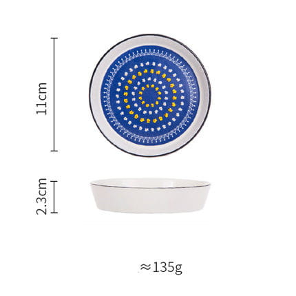 Ceramic floral bone china round serving plate in white with a blue and gold concentric circular pattern inside and a silver rim.