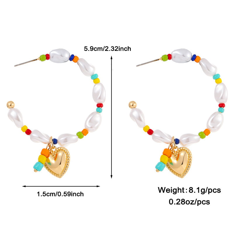 Gold heart-shaped pendant earrings with white pearl-like beads and colorful rainbow accent beads from the layered gold butterfly and pearl jewelry set for women.