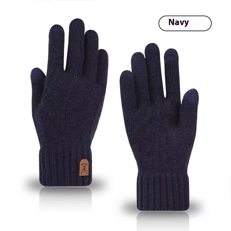 Men’s touchscreen winter knitted gloves in navy blue with ribbed cuffs and a small leather patch on the wrist showing the back side.
