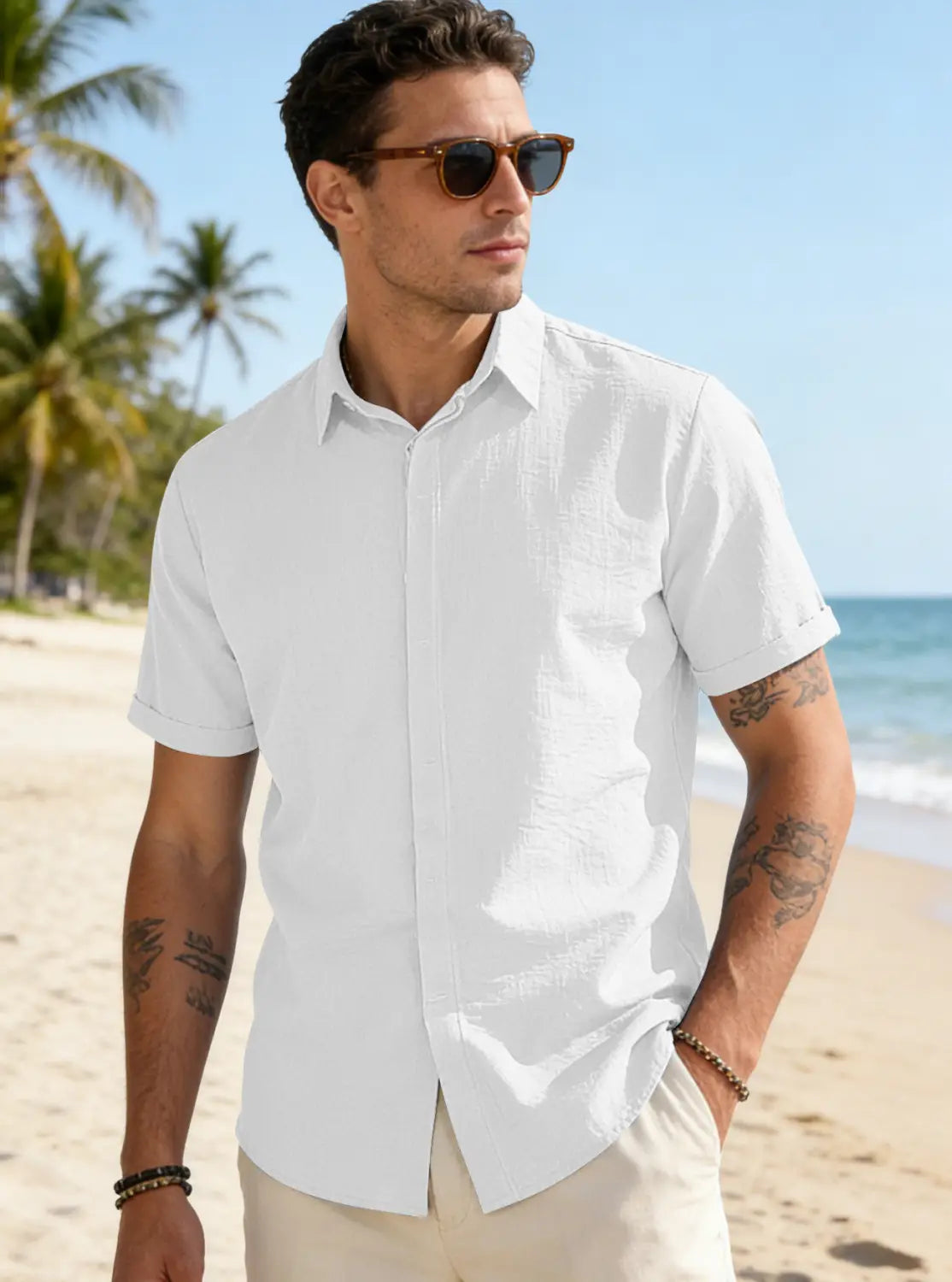 Men’s white textured bamboo linen short sleeve button down shirt with a subtle patterned texture.