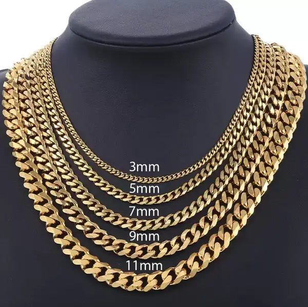 Unisex 18k gold plated stainless steel Cuban link necklaces in varying widths displayed on a black mannequin.