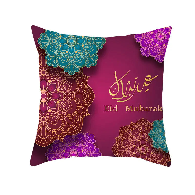 Funda de cojín de Ramadán Kareem azul y oro para linterna Eid, con un cojín vibrante de color morado con patrones mandala intrincados en turquesa y dorado y el saludo Eid Mubarak en un guion elegante.