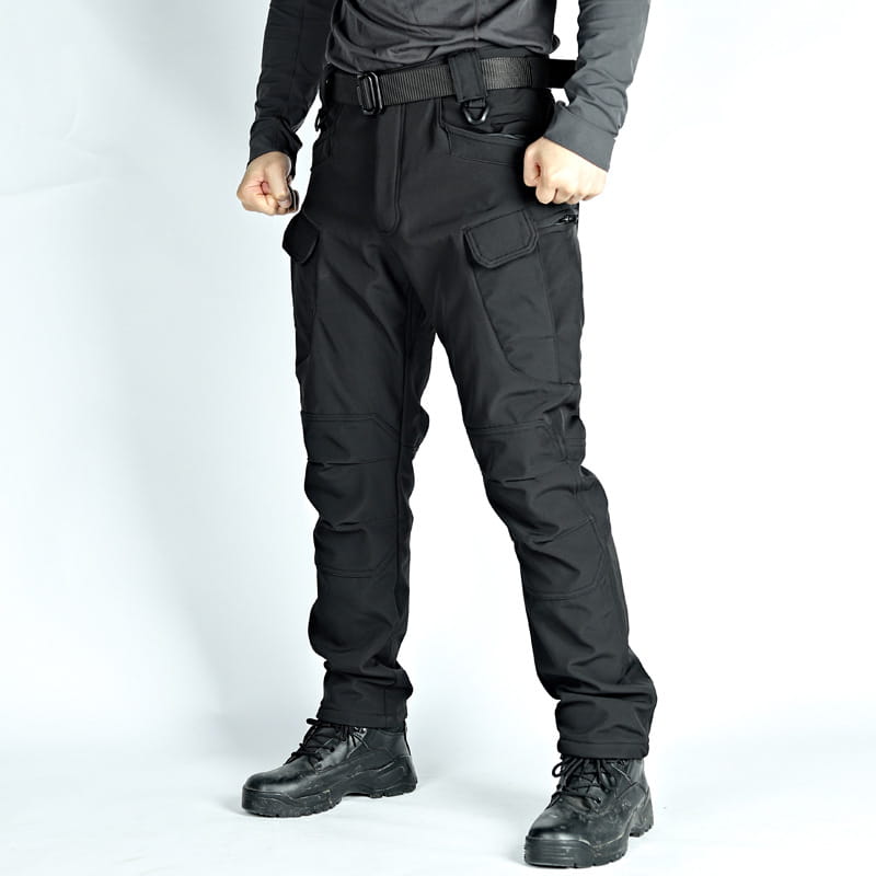 men’s black fleece-lined waterproof tactical pants shown from the back with multiple cargo pockets and a reinforced belt loop system