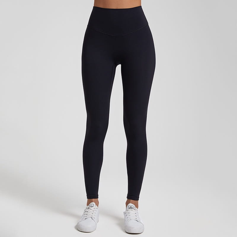 Black high waisted stretch fitted leggings made of smooth form fitting fabric providing comfortable wear.