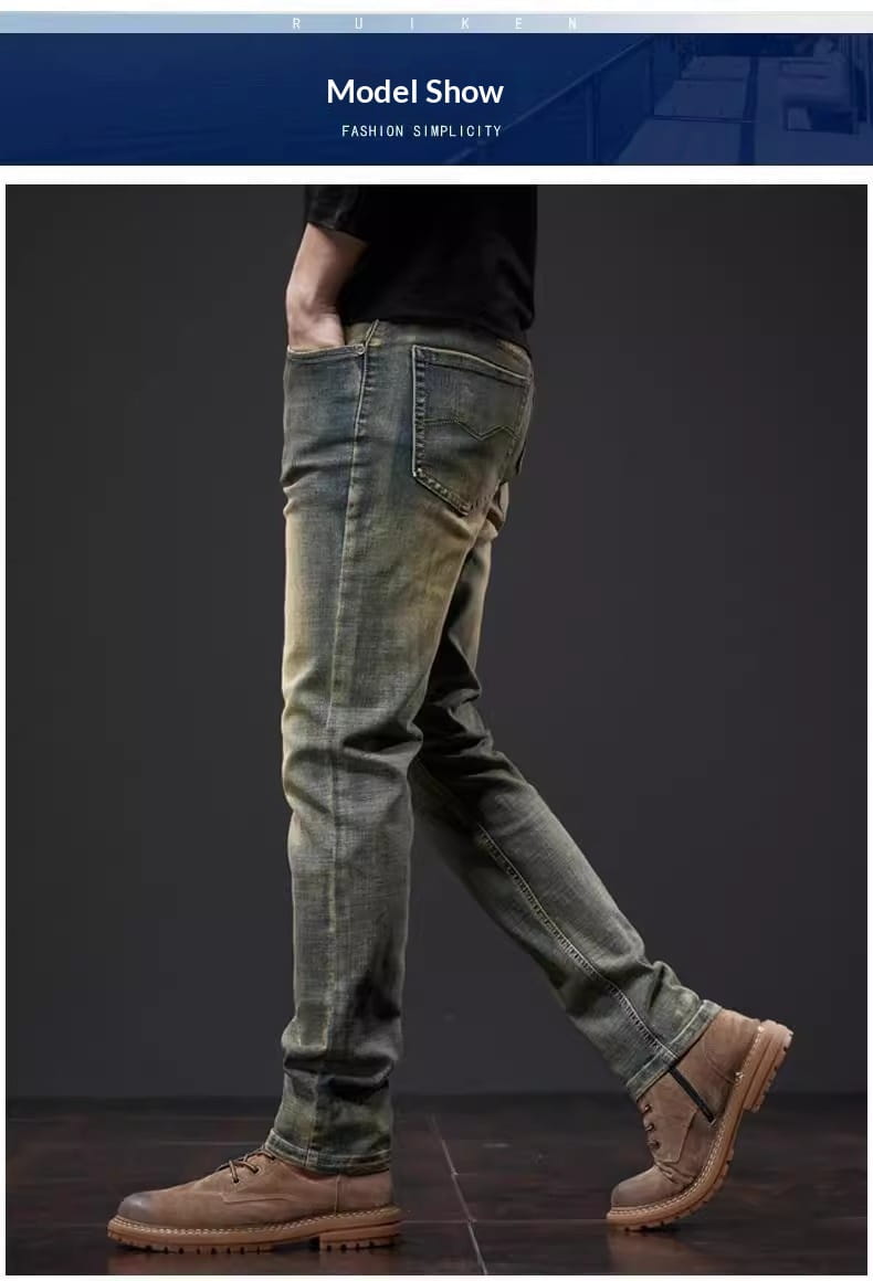 Men slim fit green denim jeans made of faded green denim with a classic five-pocket design and subtle distressing along the thighs.