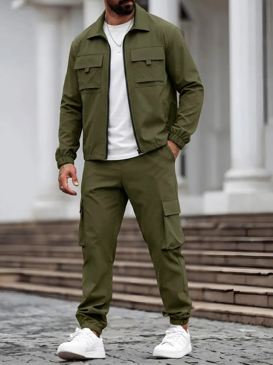 Olive green mens utility zip up workwear jacket with two chest pockets and elastic cuffs designed for durable workwear.
