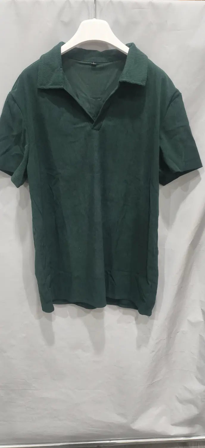 Dark green corduroy short-sleeved polo shirt with classic collar and button placket in men shorts set.