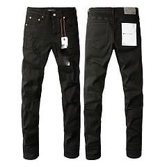 black slim fit distressed denim jeans for men featuring subtle stitching details and patchwork design