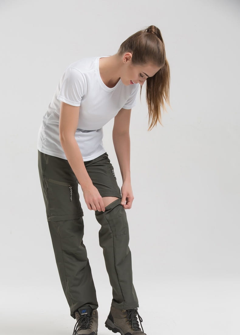 olive green convertible tactical hiking pants with multiple cargo pockets and reinforced stitching designed for durability and outdoor use
