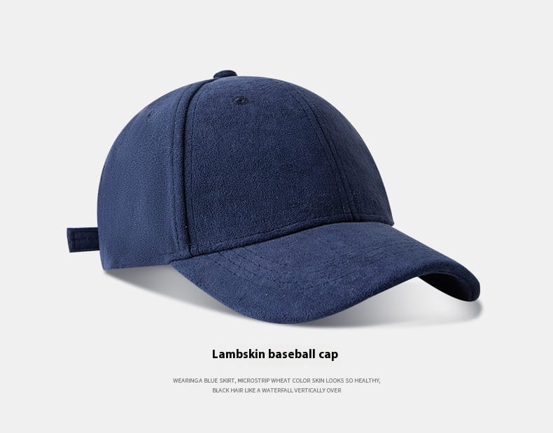 Dark blue lambskin suede baseball cap with a curved brim and adjustable strap featuring a soft minimalist design.