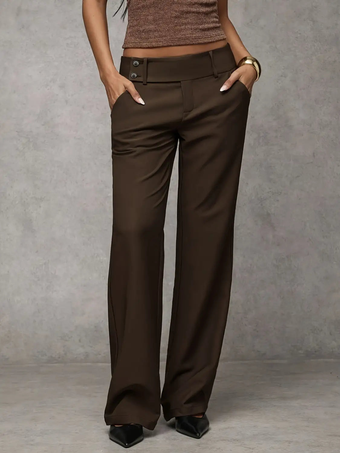 Brown wide-leg high waist casual trousers with buttoned belt detail designed as wide leg work pants.