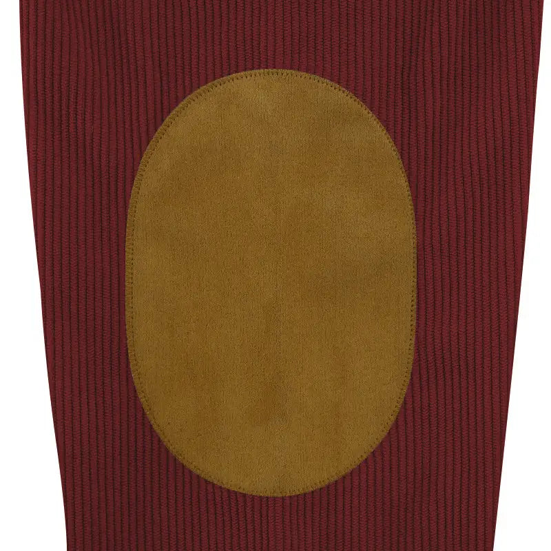a slim fit corduroy patchwork pullover in maroon featuring a tan suede elbow patch stitched onto the fabric