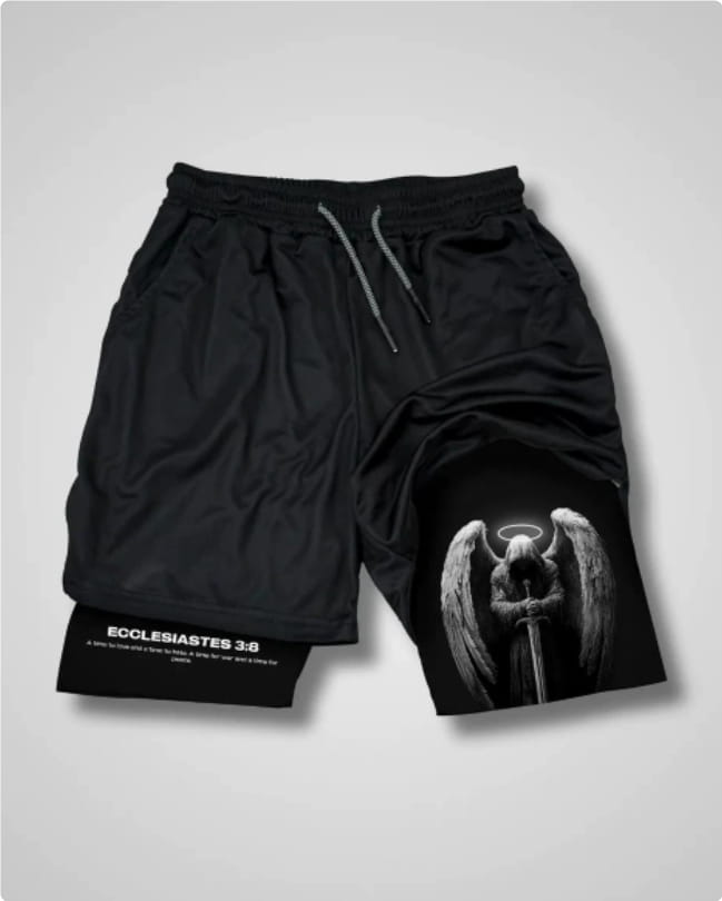 black athletic shorts featuring a detailed grayscale angel graphic on the left leg and ecclesiastes 3 8 text near the hem designed for faith-inspired activewear.