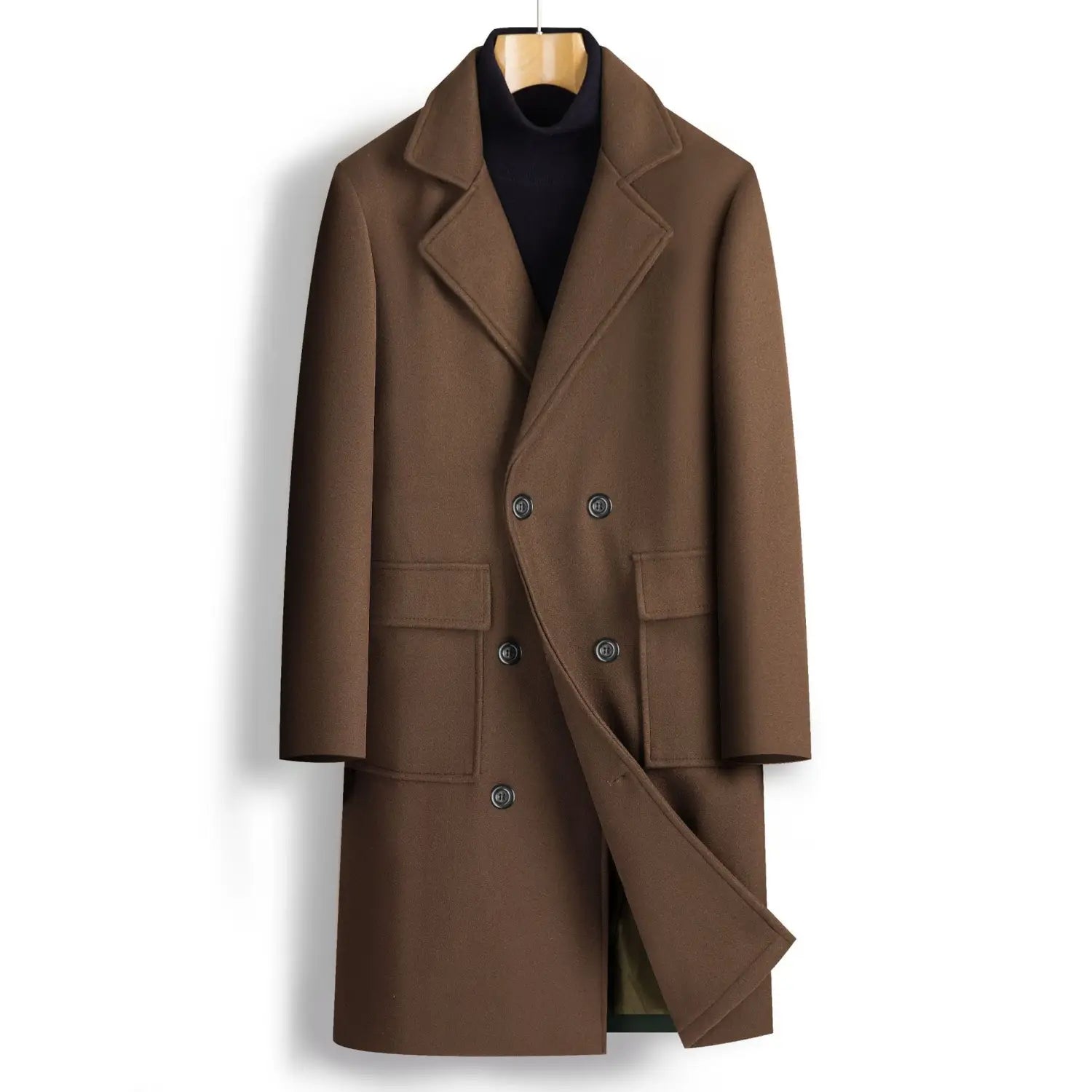 A classic brown woolen men double breasted mid length overcoat with notched lapels and flap pockets displayed on a wooden hanger.