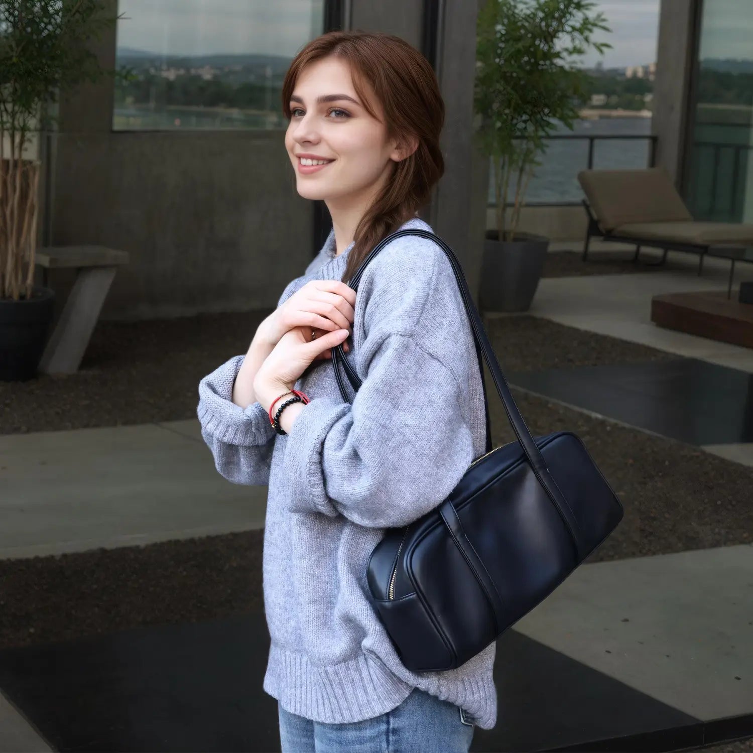 Navy blue leather single shoulder bag for women lxq026 with a sleek rectangular design and visible zipper closure.