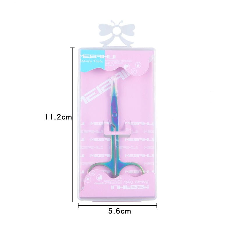 Une paire de ciseaux irisés pour taille-brow sourcils en forme de papillon en acier inoxydable bleu et vert, au design moderne et épuré, emballés dans un plastique transparent.