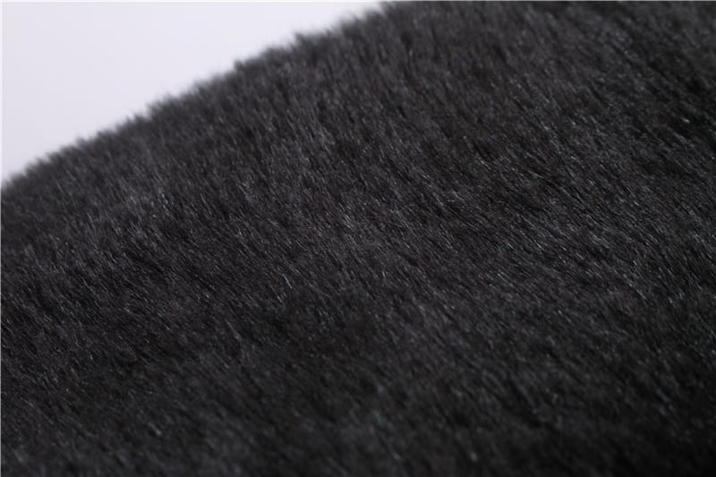 black plush faux fur fabric with dense soft texture featured in air force fur leather bomber jacket with flag lining