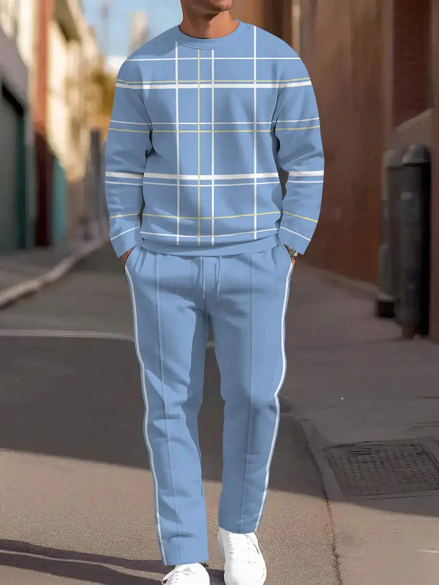 Ensemble deux pièces décontracté et sport pour homme, comprenant un sweat-shirt et un pantalon, avec un sweat-shirt à carreaux bleu clair et un pantalon de survêtement assorti, comportant des rayures latérales blanches, pour un look athlétique confortable