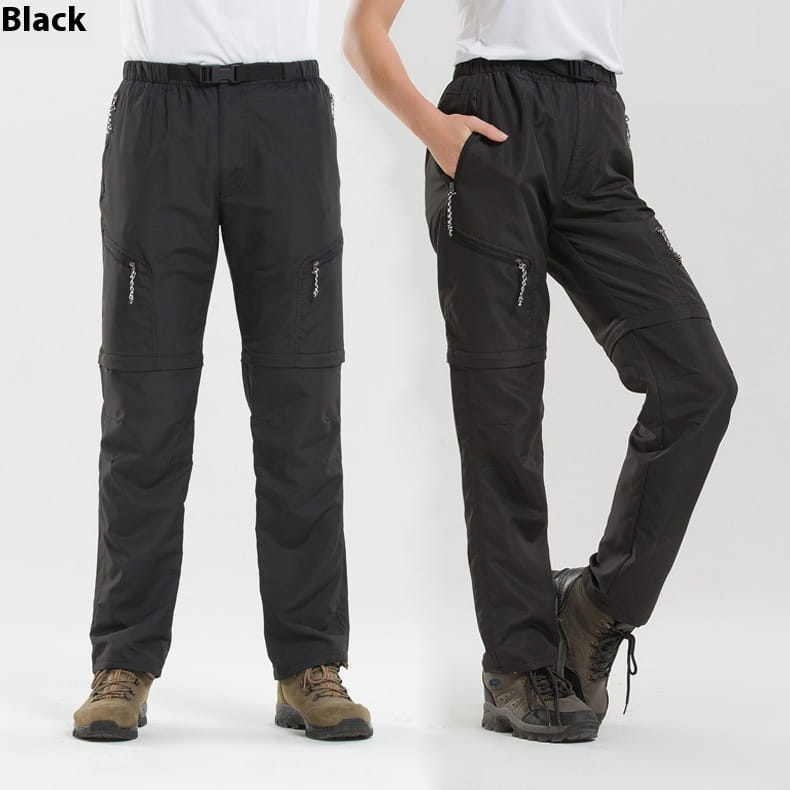 Black convertible tactical hiking pants with multiple zippered pockets and an elastic waistband designed for outdoor activities