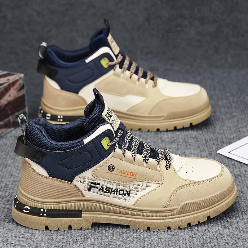 Beige and navy blue men’s high-top chunky elevator sneakers xb13 featuring fashion branding on the side with a thick sole.