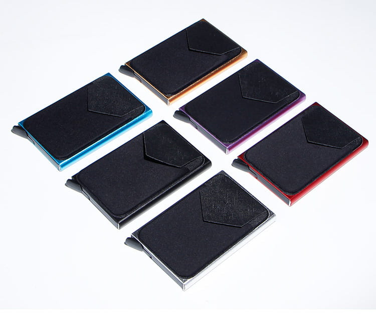 Set of six minimalist rfid blocking aluminum multi card wallets with sleek metal construction black textured interiors and vibrant colored edges in blue gold purple red silver and solid black.