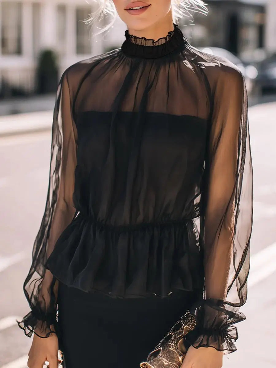 Black sheer ruffled peplum blouse with high neckline and long sleeves made of lightweight fabric.