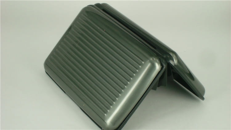 dark gray ribbed plastic card holder case featuring rf id blocking aluminum alloy construction with a sleek minimalist design