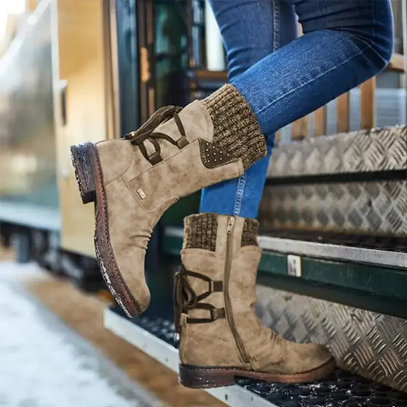 Tan suede women winter snow boots with brown laces and a knitted cuff detail designed as mid calf martin shoes.