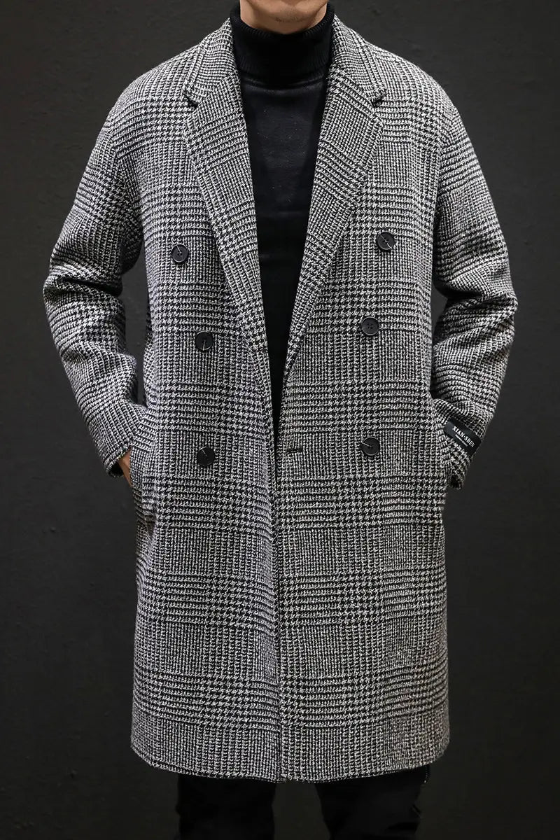 Men houndstooth wool double breasted overcoat in black and white with dark buttons and classic design.